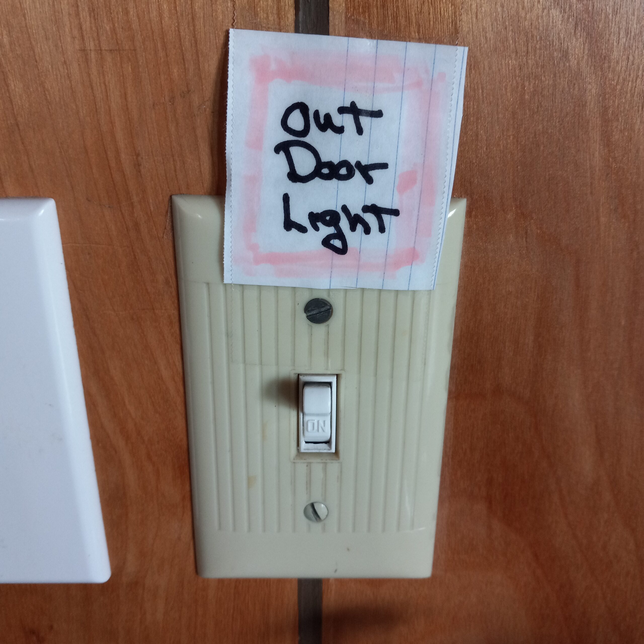 Light switch controlling the outside light fixture 